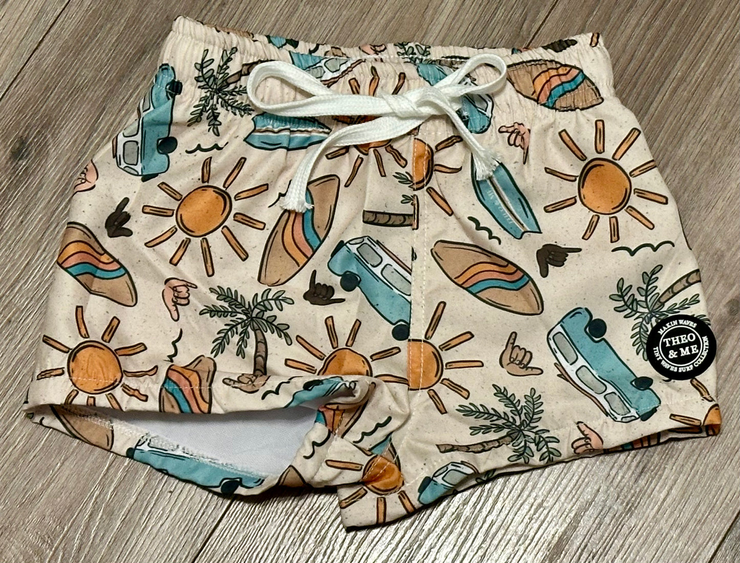 Surf’s Up Swim Trunks